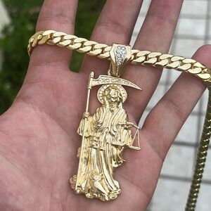 14k gold 26 inch Miami Cuban chain and reaper